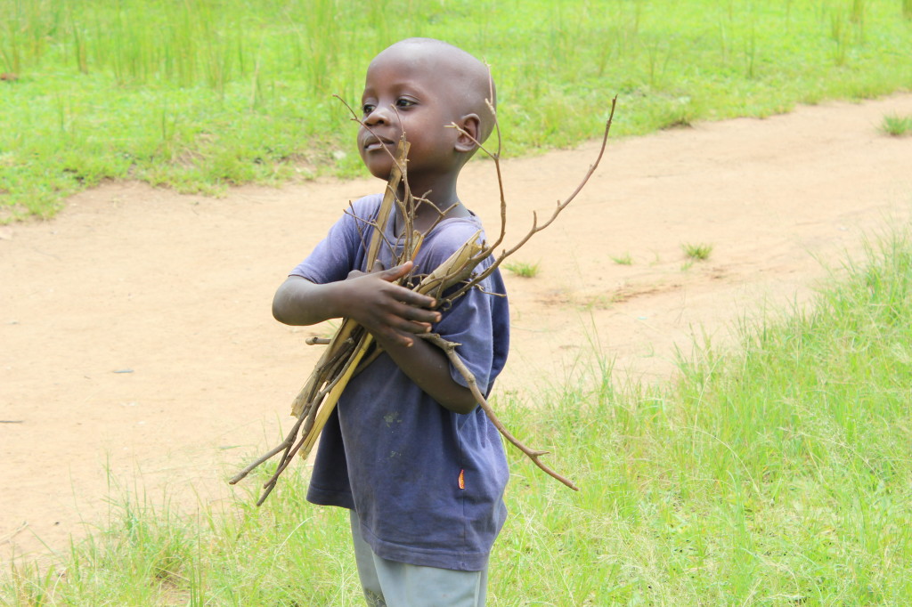 Child with sticks